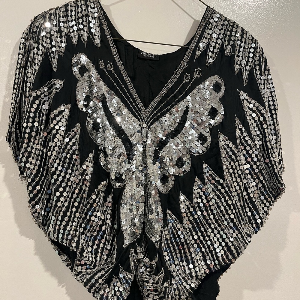 Woman’s glamorous top with sequins.